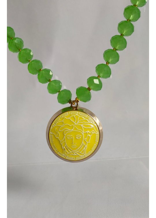 Green necklace with upcycled Versace pendant