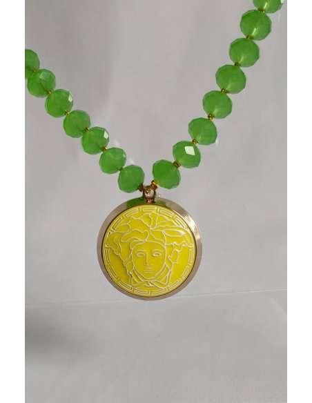 Green necklace with upcycled Versace pendant